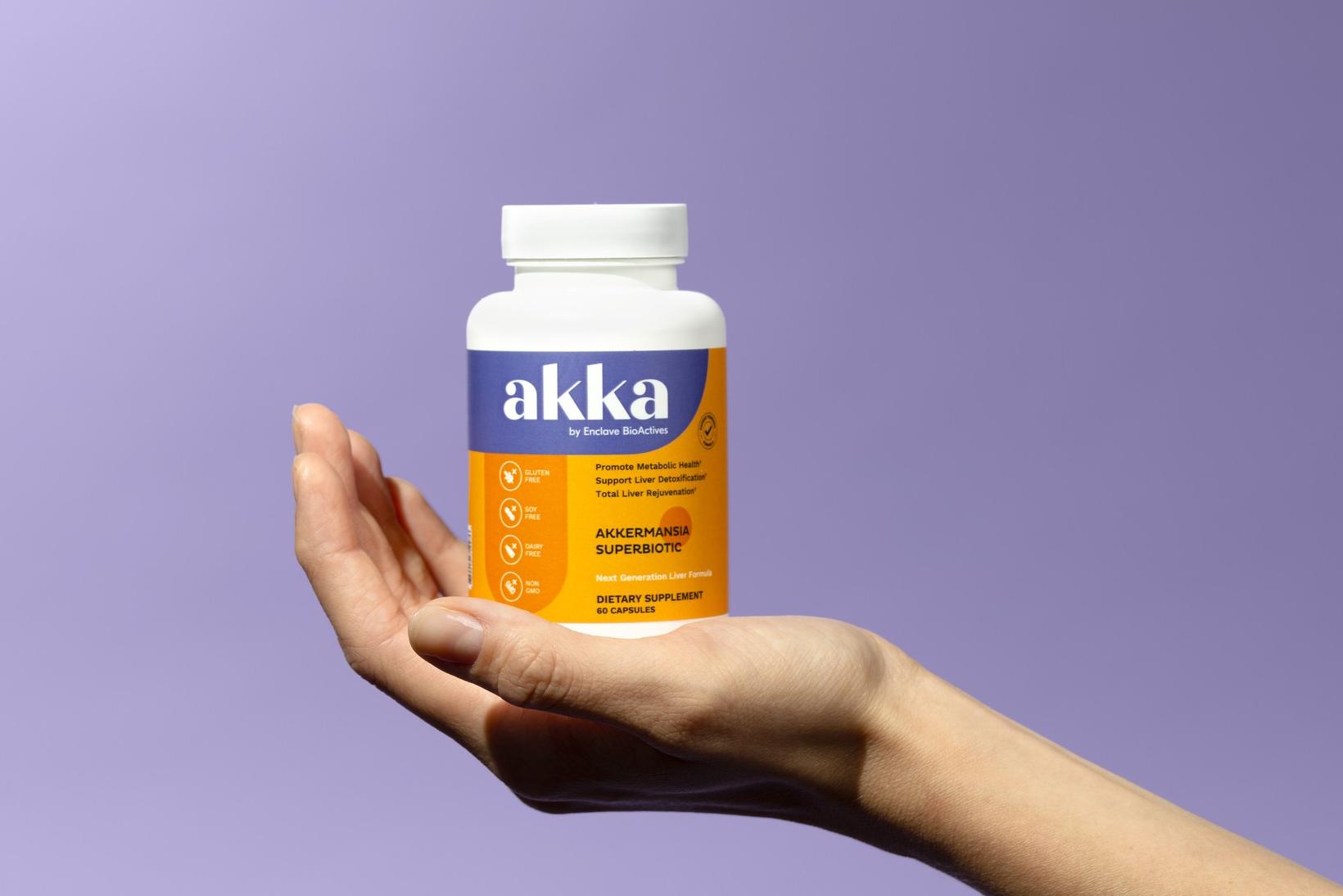 Akka Akkermansia Superbiotic bottle held in hand