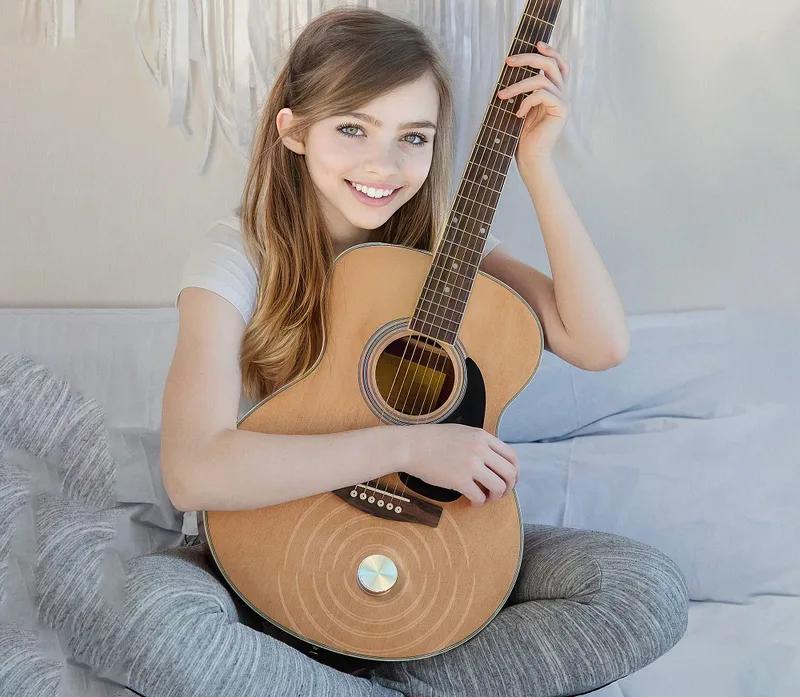 Person using Anything Speaker on a guitar