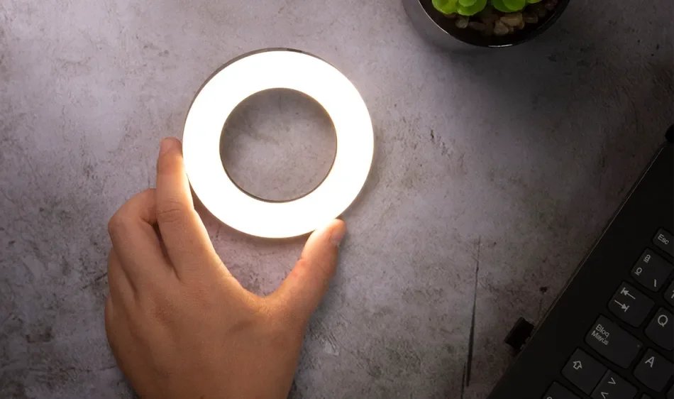 Close-up of a ring light showing its internal LED components and outer diffuser