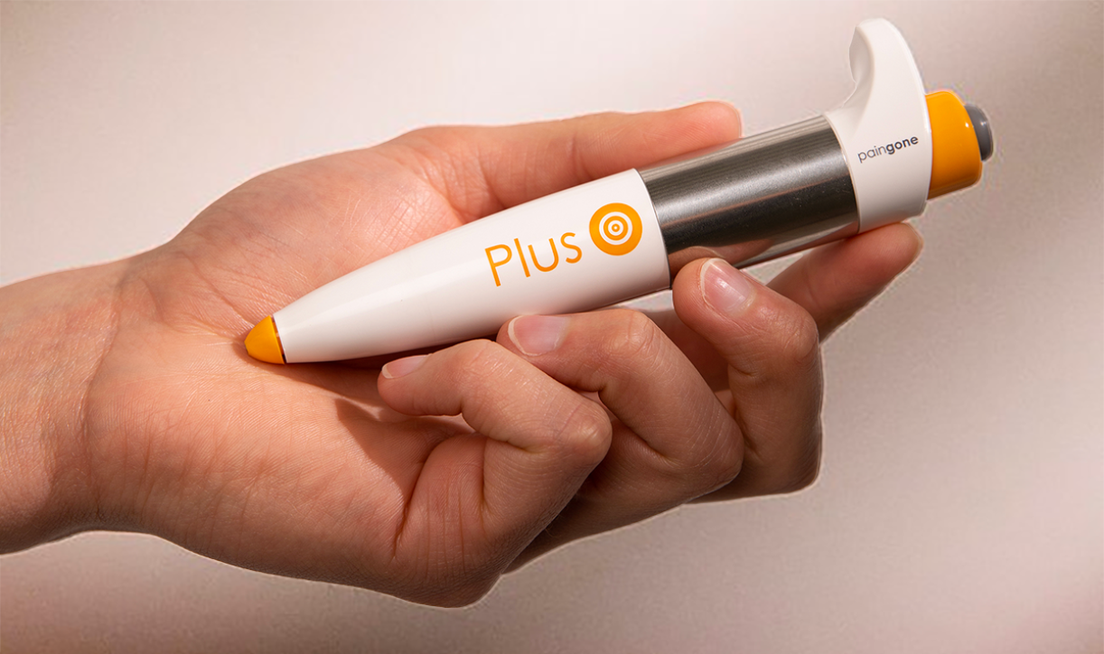 Close-up of Paingone Plus pen in hand