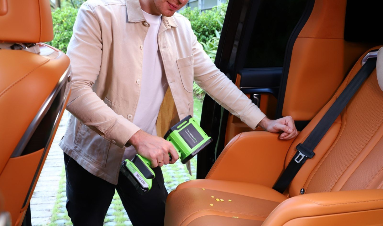 TornadoPro being used to clean a car seat